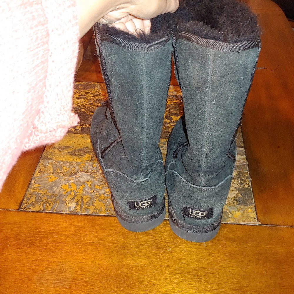 Tall black UGG boots